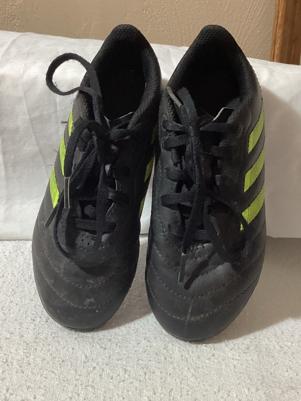 adidas Kids Black Soccer Cleats with Neon Yellow Stripes
